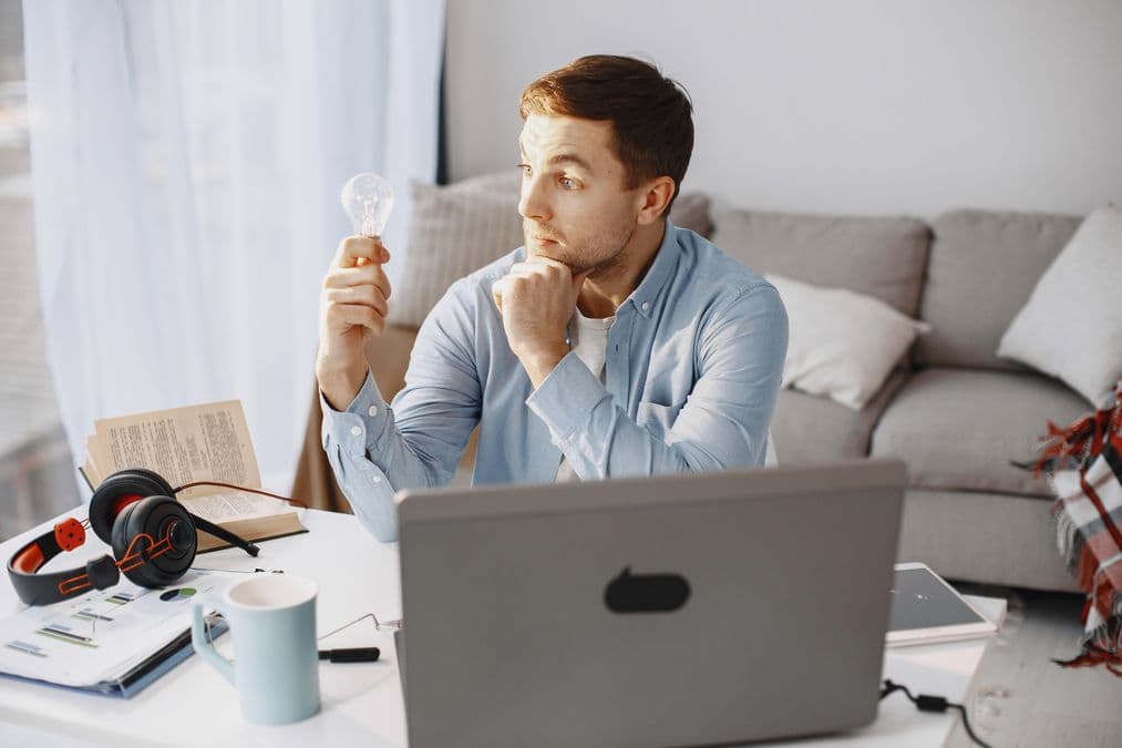 Notebook and lightbulb moment for how to patent an idea
